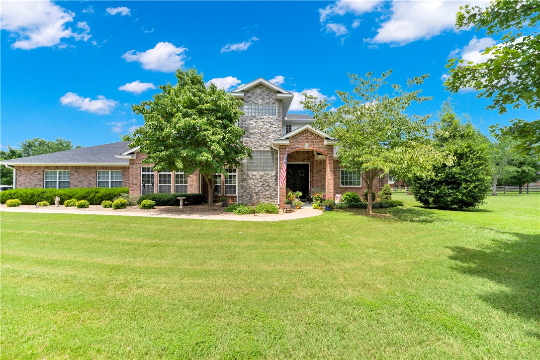 Welcome to this beautifully maintained home in the highly desirable Goshen area, situated on 3.35 private acres. A grand foyer welcomes you inside, where you’ll find a dedicated den, spacious family room, and a bright sunroom overlooking the expansive backyard. The property has been thoughtfully updated with a new roof, new interior and exterior paint, new flooring throughout, and new fencing all in 2025. The oversized garage features built-in shelving and a dedicated workspace, offering exceptional storage and functionality. Enjoy peaceful country living with room to relax, entertain, and appreciate the surrounding beauty while remaining just minutes from Fayetteville amenities. Seasonal creek view and incredible countryside views. Shed in backyard conveys, dimensions are 10x12x8. Located in desirable Fayetteville school district. Opportunities like this in Fayetteville don't come around often!