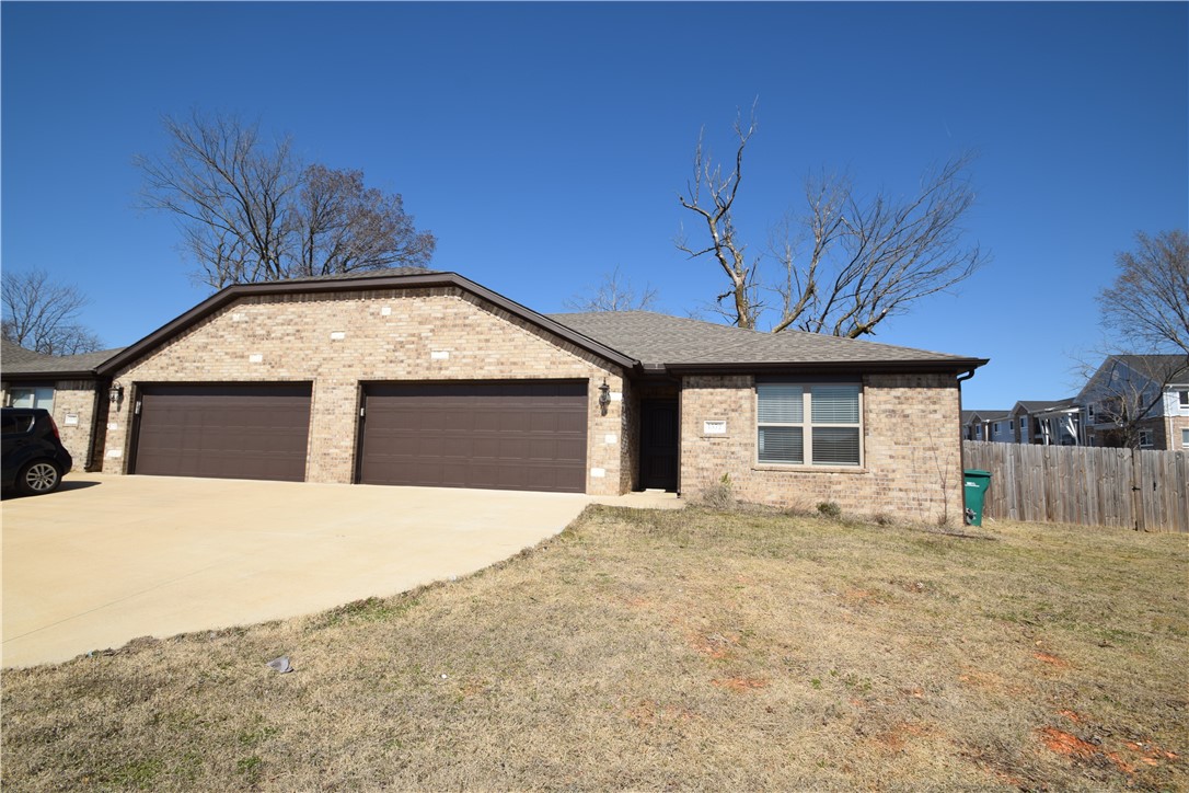 Newer duplex in great location! Close to the Wal-Mart neighborhood market on Hwy 102 and Green House Rd in Bentonville, 3 bedroom split plan, 2 baths, open living space, wood look tile in main living space and carpet in the bedrooms. Kitchen has gas range, granite and pantry. Refrigerator and washer & dryer provided. Wood privacy fence back yard. No smoking. Pets negotiable with owner approval.
