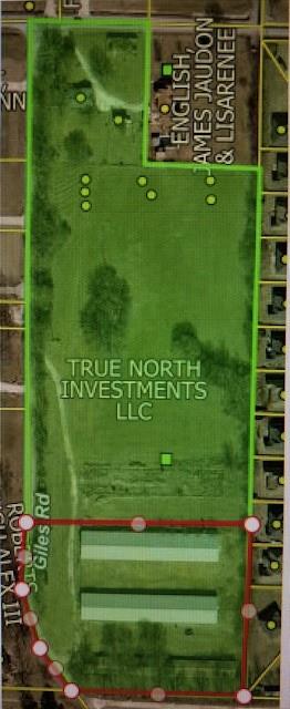 3.3 AC m/l with 2 well-maintained barns excellent for equipment storage or livestock and one older barn. Minutes from schools and downtown amenities. Well maintained paved road frontage. Electric and water onsite, and natural gas utilities at the street. Lot has a passing soil morphology (Perk Test). Additional adjacent acreage available if buyer prefers. Lot lines shown in pictures are estimations. Property split is pending final government approval. Also, see MLS# 1338585 & MLS# 1338591