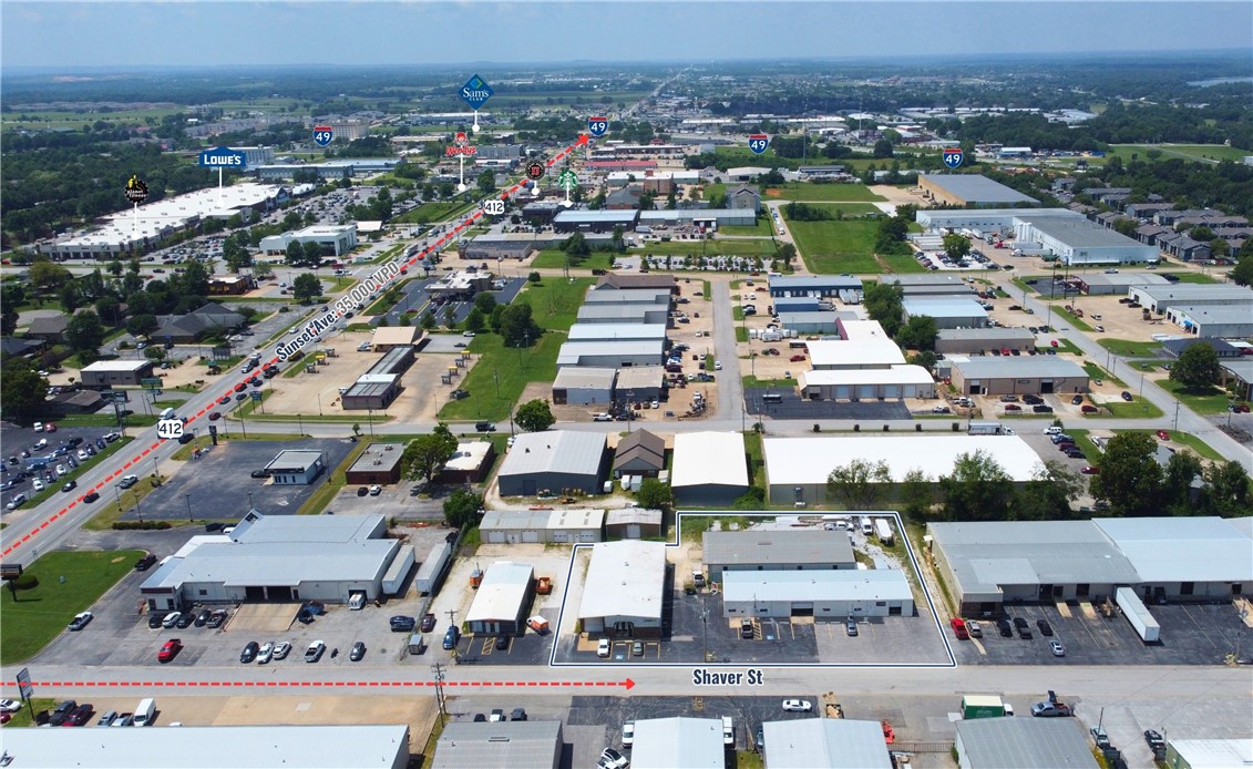 1102 – 1104 Shaver Street is a stabilized 3-building industrial portfolio in the heart of Northwest Arkansas, totaling 14,933 square feet. The property sits less than one mile from Interstate 49 and near the Highway 412 interchange—two of the region’s most critical transportation corridors—offering strategic access for trade, service, and logistics users.

The portfolio is 100% leased across three tenants, all on triple-net (NNN) structures, generating an average in-place base rent of $11.07 per square foot and an annual net operating income (NOI) of $165,319. Based on the asking price of $1,899,000, the property offers investors an attractive 8.71% cap rate. Lease expirations are staggered between 2025 and 2028, providing both stability and future mark-to-market potential.