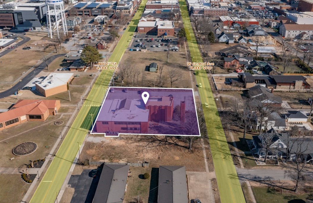 Rare development opportunity located in the heart of downtown Bentonville and between Central Ave and NW 2nd St which are major arteries connecting directly to the Bentonville Square.  Property includes an exiting structure and large surface parking lot, providing flexibility for future development or interim use.  Flat, buildable site which is ideal topography for redevelopment, minimizing prep and site work. Future Land Use Plan is Neighborhood Traditional.