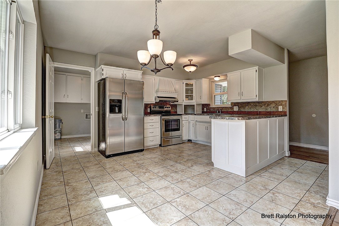 This newly remodeled charmer is situated on a quiet street located near downtown Bentonville, and schools with convenient access to Walton Blvd. Real hardwood floors added and new HVAC installed (1 year) are just a few upgrades to mention!