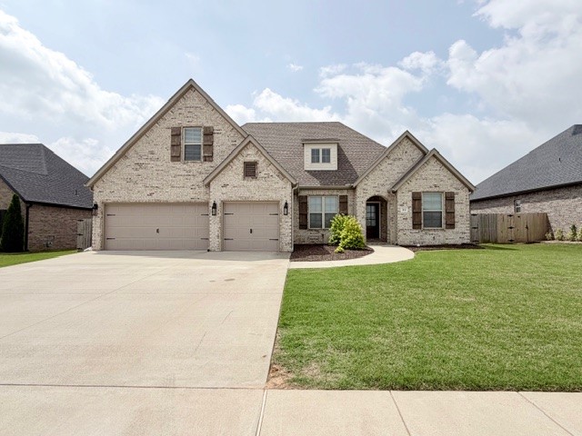 Beautiful 4 bedroom, 3 full bath home in Springdale PLUS an office! This home features an open concept living and kitchen area with a cozy fireplace. The eat-in kitchen includes a pantry and plenty of space for gathering. Tile, wood, and carpet flooring throughout. Enjoy the covered back patio overlooking a fully fenced backyard—perfect for relaxing or entertaining. Additional highlights include a 3 car garage and built-in cubbies/lockers, offering excellent storage and organization. Must see!