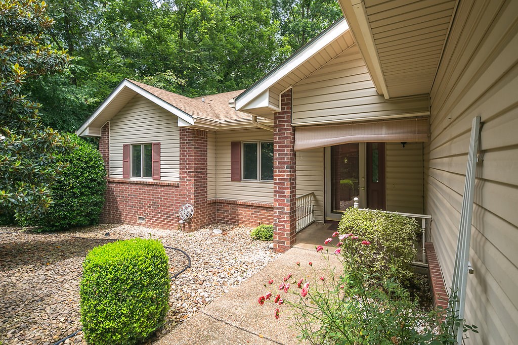 Lovely home with office. Green house, 400 sq ft mini suite not included sq ft/1/2 bath on L level. Chef's kitchen corian counters/slide out cabinets/pantry. Breakfast area,separate din rm/2nd living area cathedral ceilings. handicap m/bath w/x lg shower, screened & open decking, property cleared to property line park like setting w/gazebo. Common property on all 3 sides.  Additional room in garage for work shop or hobby. New roof 2014 new HAVAC 2010 very private-quite street/ backs Scottsdale golf course.