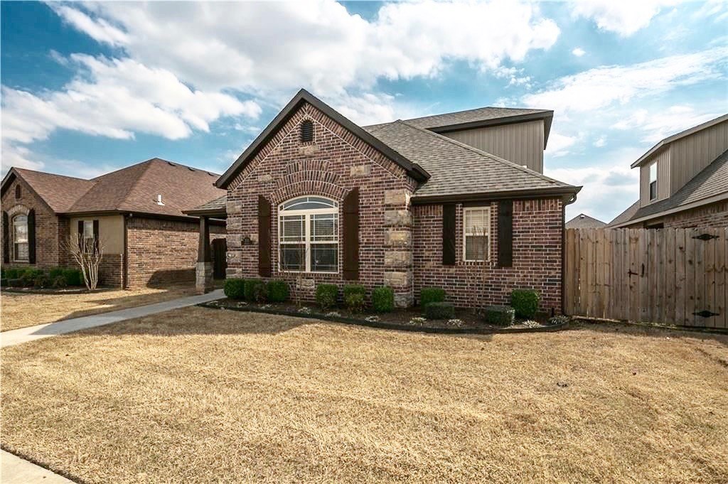 Wow, 4 Bedrooms plus a Bonus! Better than new home in desirable Stone Meadow Sub. Excellent floor plan w/ 3 beds on main level. Second level includes bedroom & bonus room! Wood flooring on main level, granite counters, stainless apps, & separate laundry rm. Fenced backyard. POA provides lawncare & landscaping. Community offers pool, clubhouse w/ kitchen & fitness center. Excellent location in Bentonville, near new elementary and middle schools.