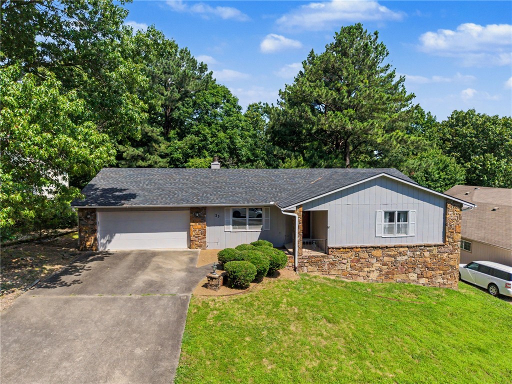 Welcome home to this Bella Vista retreat offering the perfect blend of comfort, space, and peace of mind. Situated on a rare flat lot and nestled among the trees, this inviting home features a functional layout with generous living spaces, abundant natural light, and a sunroom perfect for morning coffee, reading, or enjoying the surrounding natural beauty year-round. Major improvements have already been completed, including a new roof (2023), HVAC system (2023), and water heater (2023), giving buyers confidence and reducing future maintenance expenses. To help make the home your own, the sellers are offering a $5,000 carpet allowance with an acceptable offer. Whether you're relaxing on the deck, entertaining friends and family, or taking advantage of Bella Vista's renowned lakes, golf courses, trails, and recreational amenities, this home offers an exceptional lifestyle opportunity. Conveniently located with easy access to shopping, dining, and outdoor adventures, this property is ready for its next chapter.