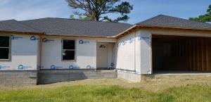 Buy and finish the way you want. This home is laid out to be a 3 bedroom 2 bath with open floor plan and garage on 1.51 acres.  The seller will install septic and finish driveway at this price, otherwise nothing else will be completed.