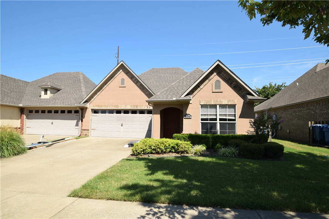 Great rental in Stone Meadow Subdivision! Community has clubhouse, basketball, and pool for your enjoyment.  Property has large living space with new vinyl flooring in living room and upgraded finishes.  Kitchen has granite countertops, stainless appliances.  Washer, dryer, and refrigerator included. Large back yard with lawn care also included. Property is 7 minutes (2.7 miles)  to Walmart home office. 3 minutes to Walmart Neighborhood Market. 6 minutes (2.5 miles) to Walmart supercenter, also near an elementary school and 3 minutes to Creekside Park.   Property available for 3 month lease or a 6 month lease at a higher monthly fee.