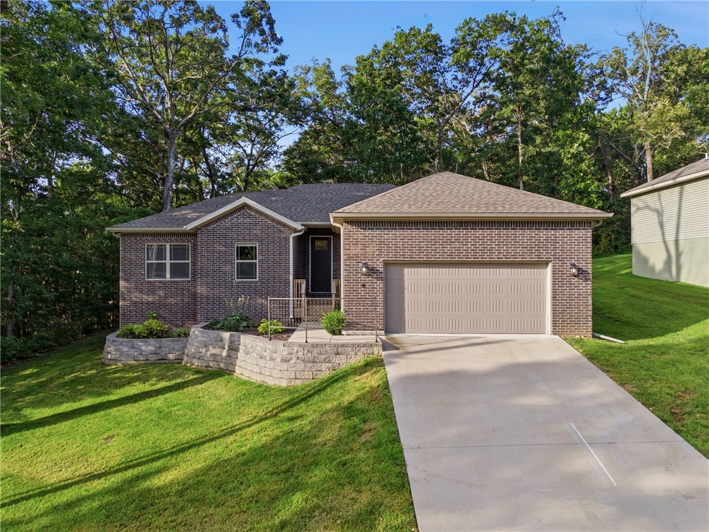 Welcome to this beautifully designed 3-bedroom, 2-bath home in the heart of Bella Vista! This 1,724-square-foot home features a bright, open-concept layout with modern finishes and a desirable split floor plan, offering added privacy with the primary suite tucked away from the secondary bedrooms. The primary suite includes a walk-in closet and private ensuite bathroom.

A spacious office provides the flexibility to work from home or serve as a potential fourth bedroom. An attached two-car garage offers plenty of space for parking and storage.

Enjoy a peaceful backyard that backs to a wooded area with only one neighboring home, creating a private setting to relax and unwind.

Pets will be considered.