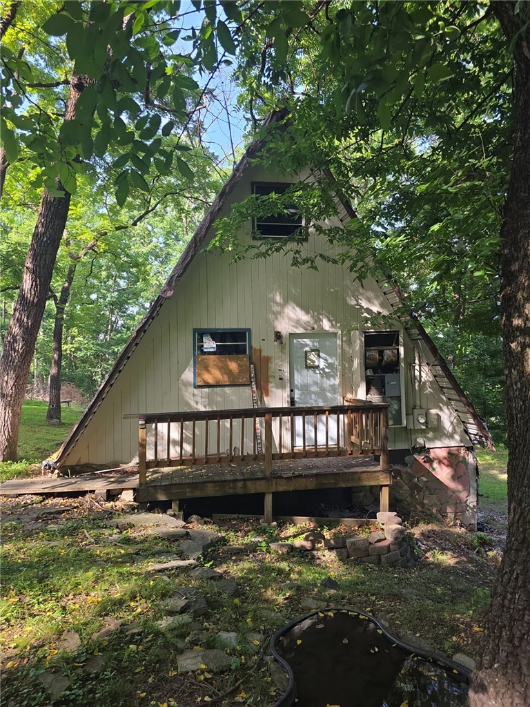 A-frame style bungalow lake house tucked away in a private subdivision. Lots of amenities and things to do for all your lake shenanigans.