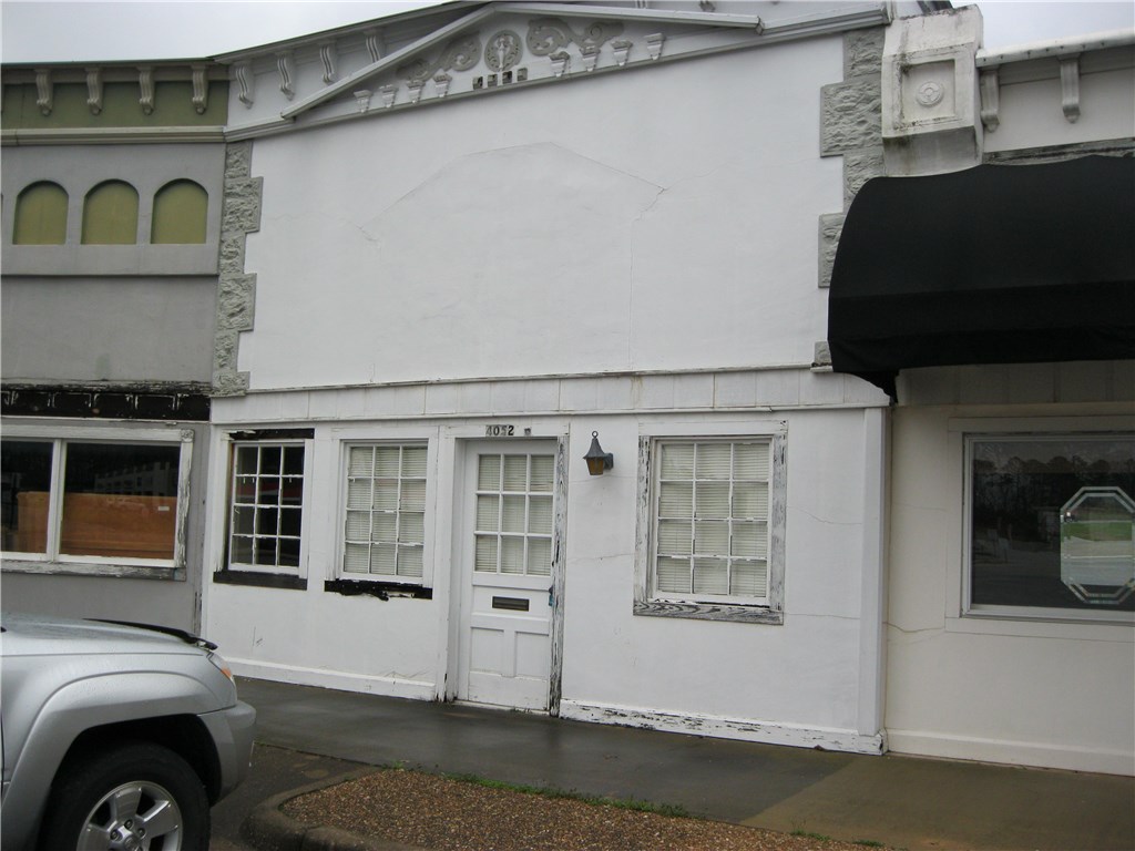 Condo in Eastgate Center. Needs tlc and was operated previously as a beauty salon. The complete roof in Eastgate Center was just recently repaired - with long life rolled roofing. Has no water meter of its own - previously shared water with condo next door.