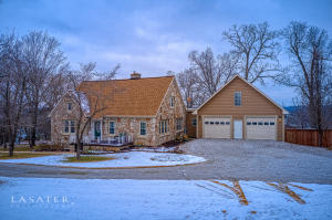You must see this beautiful 5BR, 4BA with a beautiful view of the city from atop Harrison Hill.  The Main floor has all original hardwood floors, doors and beautiful wood trim, an energy-efficient fireplace and a dining room with chandelier and built in corner hutch.  The kitchen has oversized dual-fuel oven and cooktop. Another regular sized oven and microwave. Walk-in pantry with custom wood and glass-etched door.  Laundry room has cabinets with a sink and folding counter.  Butler pantry has beautiful custom built solid-wood cabinets.  Upstairs is a large, carpeted suite with vaulted ceilings and has its own HVAC system. There is a large sitting area and multiple large closets. See Supplement for additional remarks.