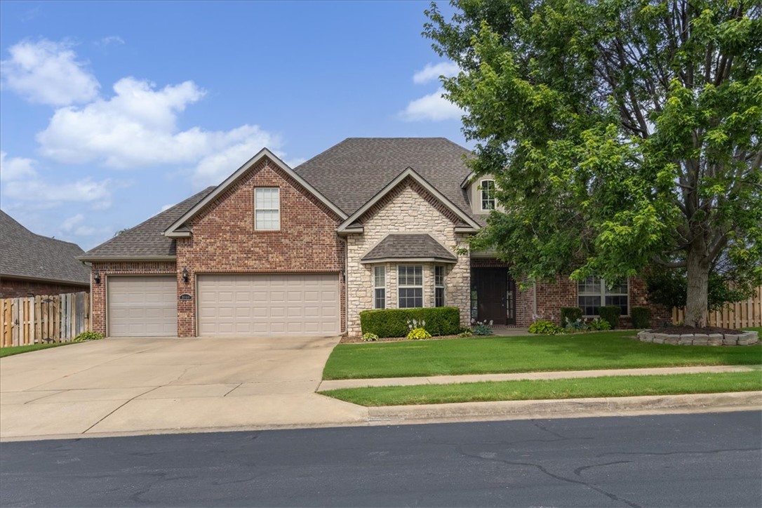 Exceptional 4-bedroom, 4.5 bath home offers over 2,990 square feet of luxury living space in the highly desirable Cornerstone Sub., where comfort & functionality come together just minutes from schools, shopping & all NWA has to offer. The main level features a large living area, 2 roomy bedrooms with en-suite bathrooms, & a spacious office, while the 2nd level offers 2 additional bedrooms with en-suite bathrooms. Galley-style kitchen includes stainless appliances, granite countertops, built-in oven & microwave w/gourmet gas range. Wood flooring & tile extend through the main living areas, w/carpeted bedrooms for added comfort. Privacy fenced yard, covered extended patio & gas connection for outdoor grilling, with a storm shelter in the garage for peace of mind. Community amenities include a pool, playground, & scenic park-like common area. Both HVAC units are new in fall of 2025 & new roof, gutters/downspouts new in fall of 2024, freshly painted interior walls, newly stained kitchen cabinets & newer appliances.