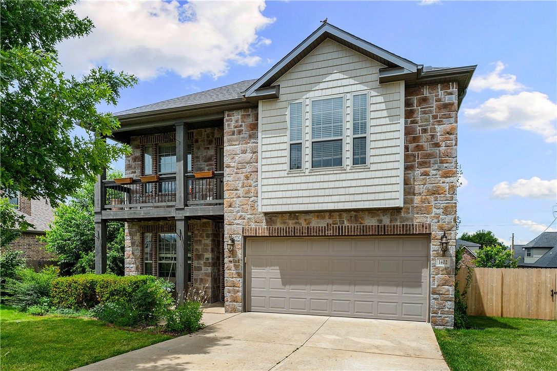 Welcome to The Hamptons—a charming neighborhood near Mt. Hebron Park & the premier shopping, dining, & entertainment of Pinnacle Hills.
This all-brick & stone 4-bedroom, 2.5-bath home sits across from the half-acre park offering extra room to play without the upkeep.
Two living areas provide flexibility for entertaining, relaxing, or working from home. The open-concept kitchen showcases a pantry, abundant workspace, and seamless flow into the family room with a cozy gas fireplace. With 2 bedrooms on the main level & 2 upstairs, the layout is ideal for guests, family, or a home office setup.
Spacious closets throughout provide exceptional storage. Outdoor living is equally impressive with a covered front porch, private upstairs balcony, a partially covered back patio/ deck, & plenty of yard space with a privacy fence.
If you’ve been searching for timeless curb appeal, a versatile floor plan, and a prime location in one of Northwest Arkansas’ most desirable areas, this home delivers.