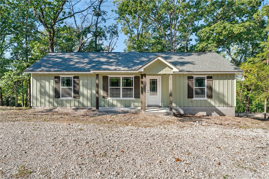 Nestled in the serene Ozarks, this newly constructed 3-bedroom, 2-bathroom home blends modern design
with natural beauty. Spacious living areas feature large windows that flood the space with natural light
and provide picturesque views of the surrounding landscape. Adjacent kitchen space offers plenty of room
for customization, perfect for culinary creations and entertaining guests. Master suite provides a private
retreat with an en-suite bathroom for comfort and convenience. Step outside to the back deck, ideal for
relaxing while enjoying tranquil views of the property. Just minutes from Beaver Lake, easy access to
boating, fishing, and hiking enhances outdoor living opportunities.