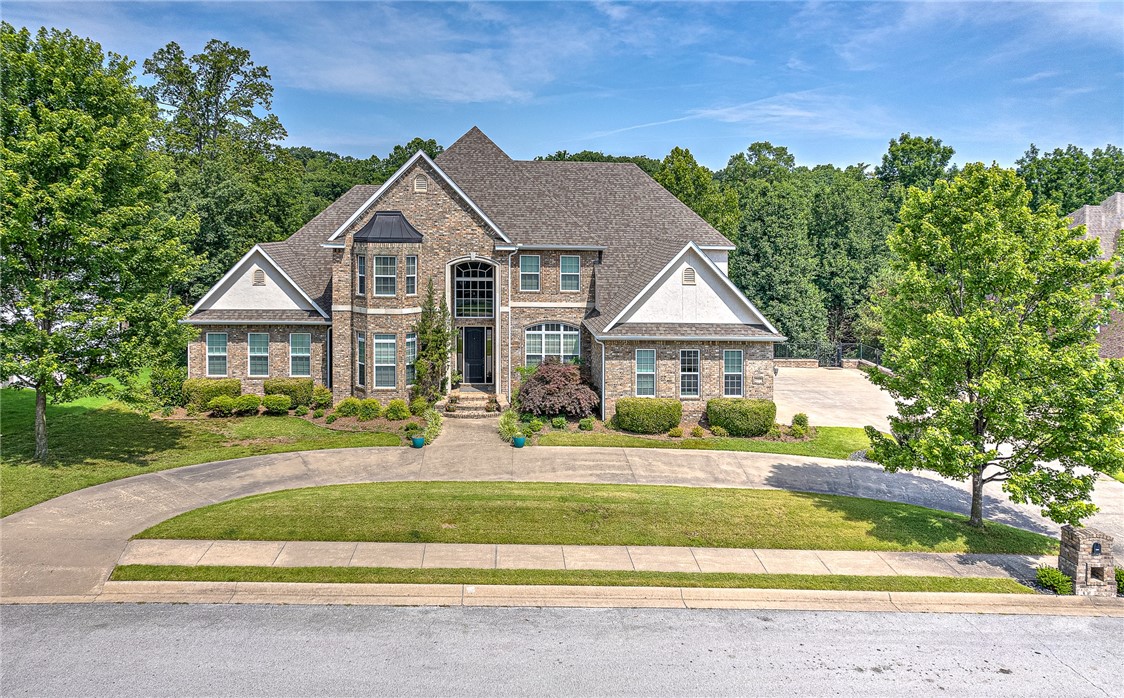 This incredible updated executive home is located in sought after Heathrow S/D and is just a short distance to the downtown Bentonville area, trail system, and dog park. Featuring a spacious gourmet kitchen that opens into the family room, this home is perfect for entertaining a large group or spending quiet evenings at home. The oversized master bedroom with huge en-suite is perfect for relaxing after a busy day. The remaining large bedrooms located upstairs gives everyone their own space and privacy. Completely renovated in 2020, the finished walk out basement features a kitchenette with dining bar plus extra rooms for exercise, hobbies, or a workshop. The private in-ground gunite swimming pool is the perfect place to entertain friends and cool off. The features of this home are too numerous to mention and you must see it to appreciate everything it has to offer!  Showings to start Thursday, 6/23/2022.