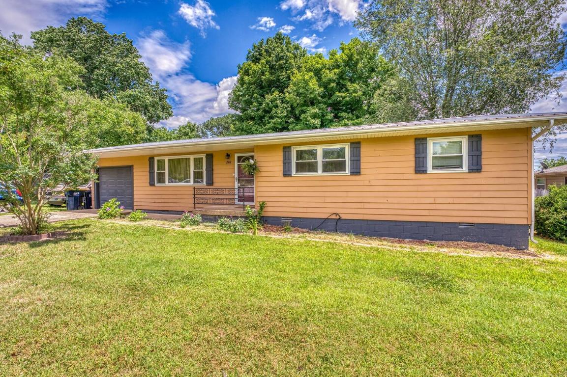 Nice and conveniently located is this 3 bedroom, 2 bath home with many recent updates including newer windows, completely remodeled kitchen with gorgeous countertops, and newer A/C unit. This lovely home also features a metal roof, seamless gutters with a lifetime warranty, a well organized shed with power, and an enjoyable completely covered 16 x 20 deck