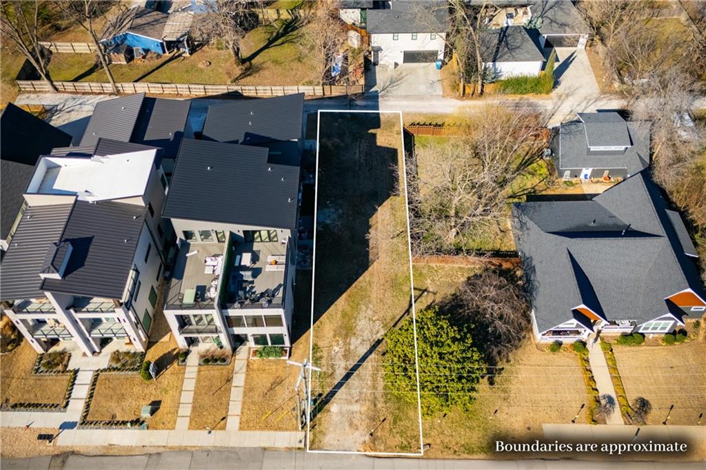 Rare opportunity on D Street in Bentonville! One of the few remaining lots located in the heart of downtown Bentonville’s continued growth and development district. This listing includes the lot, full architectural plans, and construction with Rob Nelson of Meadow Lake Homes, offering a seamless opportunity to build a thoughtfully designed custom home in one of Bentonville’s most desirable locations. Conveniently located near Downtown Bentonville, the Razorback Greenway, shopping, dining, parks, and more. Buyers will have the opportunity to personalize finishes and selections while working with a respected local builder known for quality craftsmanship and attention to detail. A unique opportunity to build your vision in the heart of Bentonville.