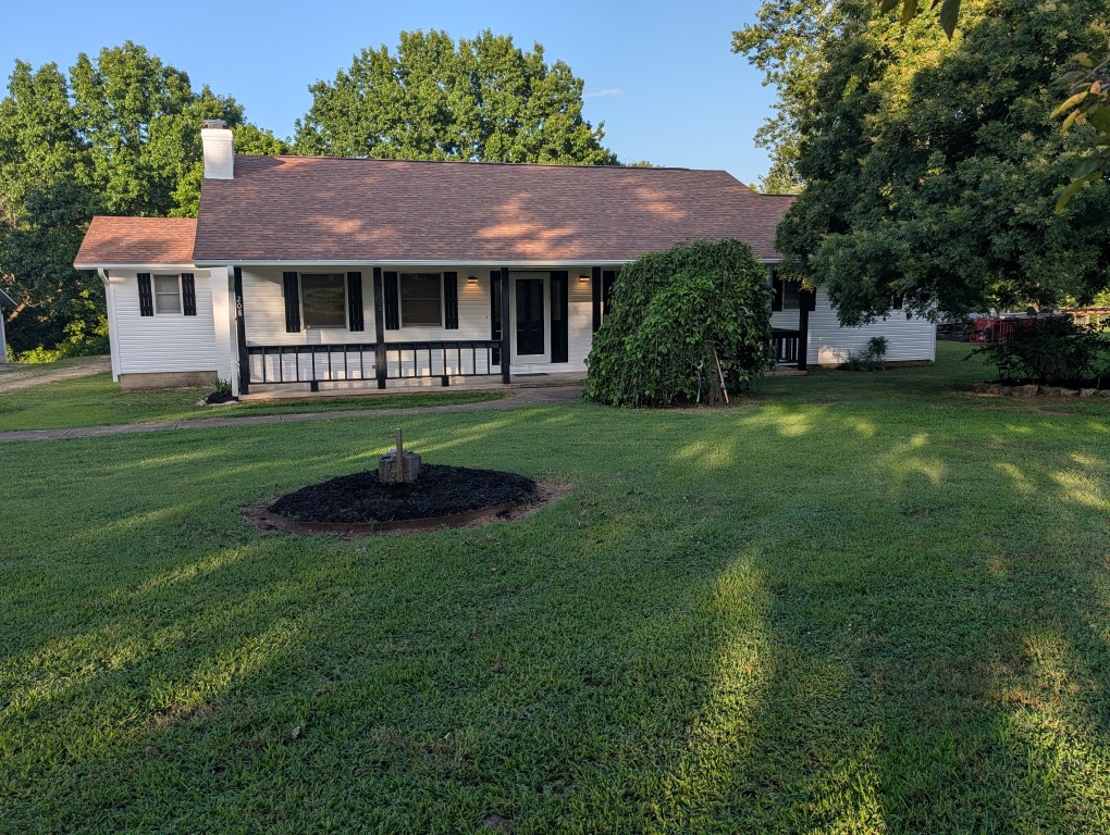 Nestled on 0.81 acres on year round Mill Creek, this beautifully updated home boasts a huge living room, along with a spacious dining room and large kitchen featuring granite countertops and plenty of room to cook and entertain. There are many recent updates, including new siding, new paint, flooring & water heater, giving the home a fresh, modern feel while maintaining its charm. Outside, relax on the large covered front porch overlooking the beautiful setting, and enjoy the convenience of a 2-car garage. With a generous 1854 square feet, quality updates, and a scenic creekside location, this property is one you won't want to miss.  All #s are approx, age & sq footage per assessor,  Agent​​‌​​​​‌​‌​​​‌‌​​​‌‌‌​​‌​​‌‌​​​​ owned.