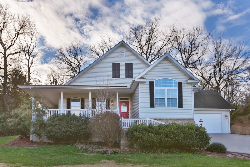 You will love this traditional home with a large living room, formal DR, office, master BR, and BR 2 on main level.  Office can be 4th bedroom.  Guest room & bath are upstairs   A fabulous cook's kitchen awaits with great storage.  Seller is using  the basement as an exercise room and you will love the storage space.   Bella Vista living offers great amenities for  golf, fishing, boating, and FUN! See this inviting home with wrap around porch and the perfect patio for relaxing. Adjacent lot is available for purchase.