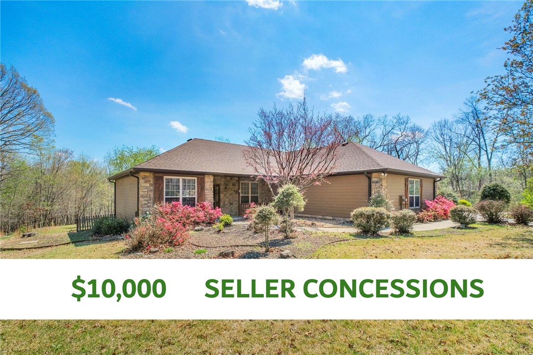 $10,000 in Seller Concessions!!! If you're looking for place where you can slow down and truly breathe - this is the ONE for you. A rare opportunity in Bella Vista, this timeless home sits on 6.77 acres providing the perfect blend of space, privacy, and natural beauty. Inside you'll find an open kitchen with a pellet stove in the living room that you can cozy up to. This 3 bedroom, 2 bathroom home has a split floor plan with additional office space. The exterior features cedar siding with stone accents, blending seamlessly into the landscape, along with a 3-car garage for added functionality. A unique opportunity to enjoy a one owner and well maintained home with acreage, privacy, and potential in one of Bella Vista’s most desirable settings.