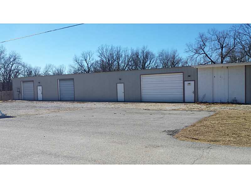 Location is easy access to 71B & I49 yet you won't have to pay premium price. The options are unlimited for this combo office & warehouse. 3 shops with overhead doors and Office areas complete with a full size kitchen and bath. Some finish out in the,office areas still needs to be done but mostly paint and trim. This property sits on over 5 acres for plenty of room to grow across the street and beside current building. Shops are nice sizes and have electric in them. There is also a fenced in area.