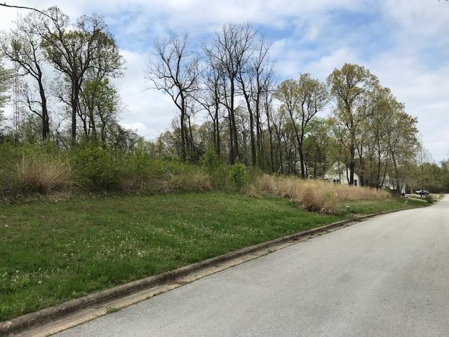 Nice tree shaded building lot in very private subdivision in Harrison. All utilities are in. Established neighborhood.