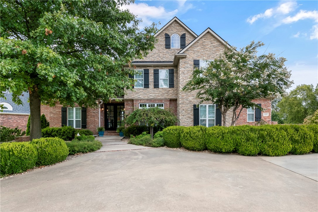 Here is the home you’ve been looking for – a 3-level home loaded with amenities for your family and guests.  Set on a 1-acre lot in Rogers' highly-sought neighborhood, The Manors at Blossom Way Creek, this location offers immediate access to Pinnacle/Promenade shopping & entertainment venues and I-49 for easy commute times to all of NWA. 

The main level includes the spacious primary suite, an open concept living / dining / kitchen space new in 2021 with upgraded SS appliances, quartz countertops and a walk-in pantry.  Use the main level flex area to suit your needs - more living space, an office or library?  Upstairs are 3 generously-sized secondary bedrooms & 2 full baths.  The lower level includes a 5th bedroom suite, a private office / craft / studio room, entertainment space galore and access to the backyard retreat.  Here you’ll find a heated saltwater pool, a 12x20 redwood pavilion with full outdoor kitchen and your own basketball court!  Thoughtfully designed, quality throughout, this one won't last long!