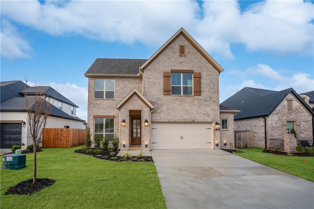 Beautifully designed home in a prime location offering easy interstate access, nearby shopping, and convenient to area schools. Just steps away from the stunning 120-acre Shaw Family Park, this home perfectly combines convenience and comfort.

Thoughtfully upgraded throughout, features include an enlarged covered patio, twin glass panel doors, and a single oven with cooktop—perfect for entertaining or relaxing evenings at home. The extended primary suite includes a freestanding tub and expanded walk-in closet, creating a true retreat. Additional highlights include kitchen cabinets to the ceiling, optional transom windows in the family room for added natural light, garage storage, and an additional fourth bedroom with private bath.

With elevated finishes, a functional layout, and exceptional location, this home is the perfect blend of style and practicality.