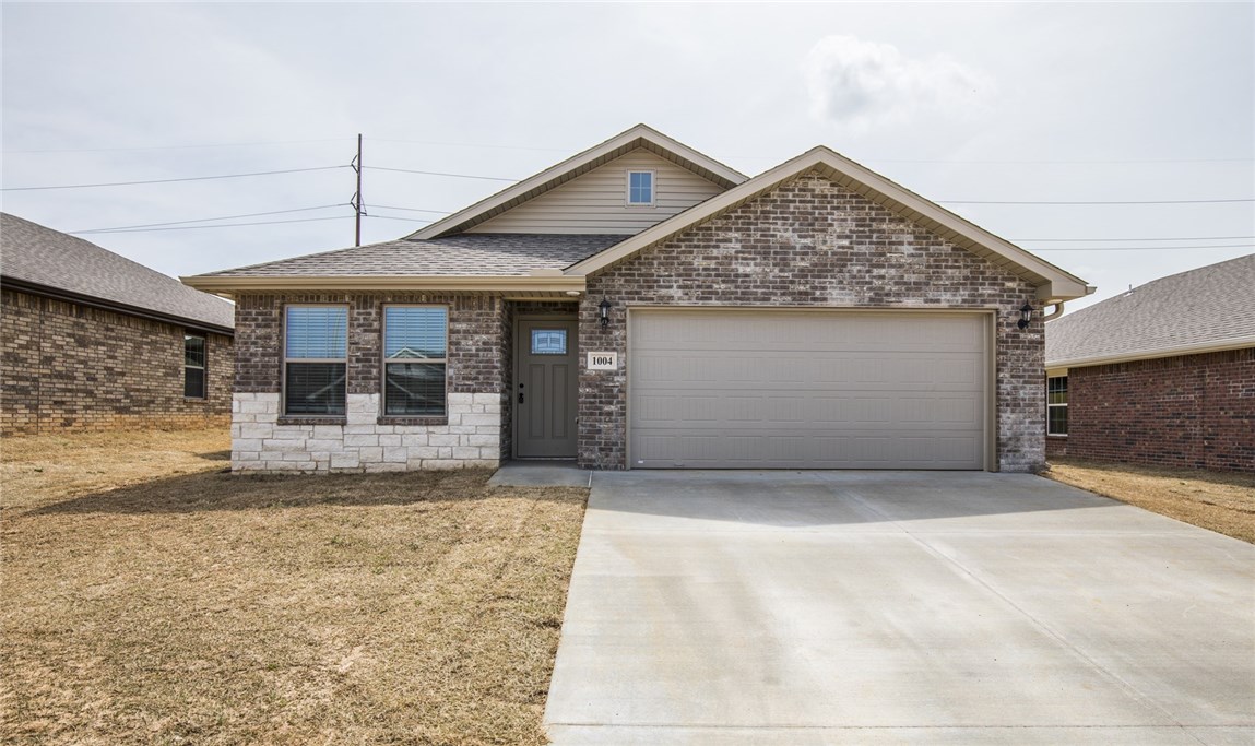 New constructions!!! This 3 bedroom 2 bath has great open floor plan, hardwood flooring thru main living area, carpet in bedrooms, granite counters, stainless appliances, refrigerator included, 2 inch blinds. Fenced yard.