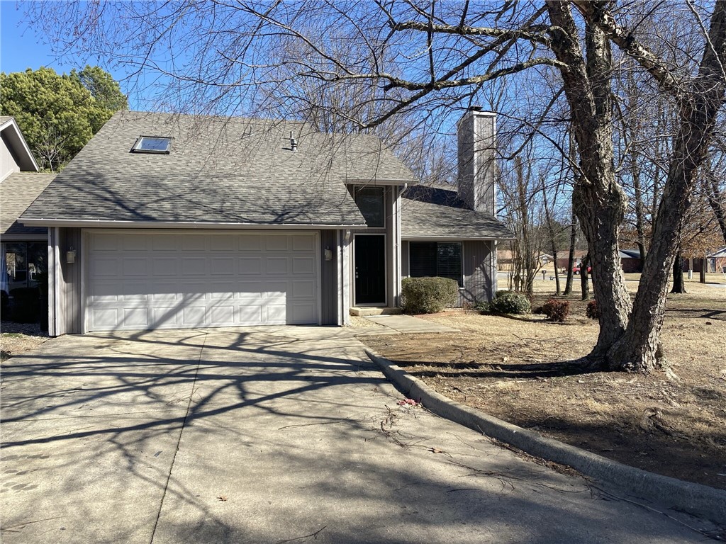 Great 3-bedroom, 2-bath condo in Rogers with an attached garage! Features include stainless steel appliances installed in 2021, granite countertops, solid-surface flooring on the lower level, and carpet upstairs. Enjoy a cozy wood pellet stove in the living room. Walking distance to shopping, and lawn care is included.**NO PETS**
