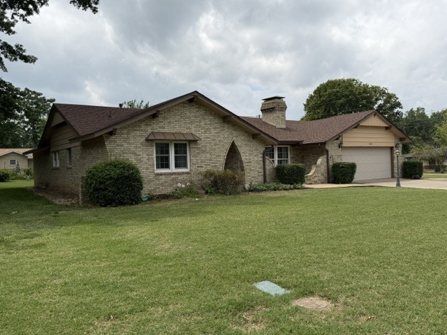 Custom built home witt only two owners; three bedrooms and 2 1/2 baths; Lots of storage; kitchen has pull out cabinet drawers; pantry; large living room with fireplace; property comes with refrigerator and washer/dryer (as-is with no warranty); nice enclosed patio; very nice large backyard.