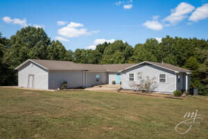Beautiful country setting just 10 minutes from Harrison and 20 minutes from Bull Shoals Lake!!  This move in ready 3 bedroom; 2 bathroom home features beautifully updated kitchen, large living area with gas fireplace and plenty of storage.  The master suite is a dream from the fireplace insert to the large en suite bathroom with tiled shower and double sinks and walk-in closet!! Enjoy the great outdoors on the back deck with plenty of room to add a pool! This home has a 3 car garage.  One of the bays is heated and cooled (not included in H/C square footage in listing) and has been converted more into a workroom area but could easily be converted back to garage space or used as a home gym or game room area.