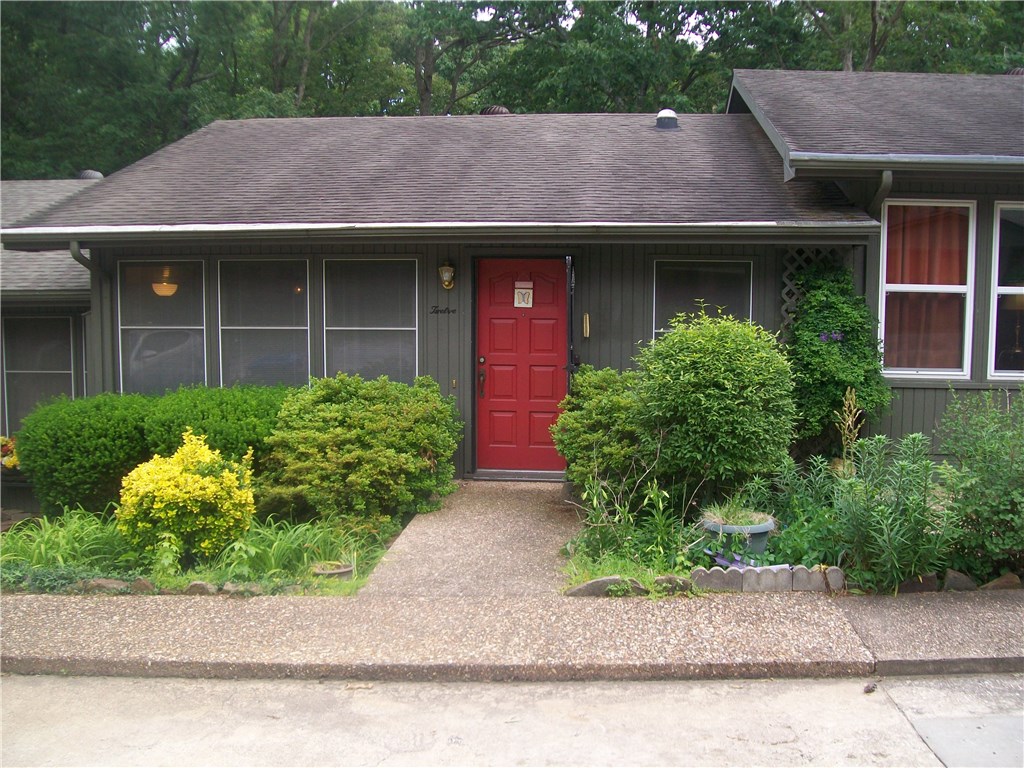 Must see Townhome with updated kitchen and new HVAC in 2011. Master bedroom and full bathroom on main level.  Two bedrooms with closets but no windows and a full bathroom on lower level.  Living area both upstairs and downstairs.  Sit and enjoy the birds and the view from the deck.  There is enclosed storage off of deck.