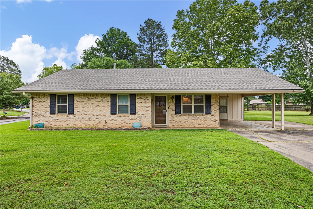 Welcome to 1108 Magnolia Lane, a well-maintained 3-bedroom, 2-bath home offering 1,267 sq. ft. of comfortable living space on a large corner lot in one of Booneville’s established and welcoming neighborhoods. Inside, you’ll find fresh paint, new blinds throughout, updated countertops, new appliances, and nice-sized bedrooms, including a primary suite with its own private bath. The large utility/mud room with built-in storage is conveniently located off the carport, adding function and flexibility to the layout. Outside, enjoy a covered patio overlooking the spacious backyard, perfect for relaxing, entertaining, or gathering with family and friends. A large concrete pad offers versatile options for a future shed, carport, or workshop. With a new roof, move-in-ready condition, and a price of just $142,500, this home offers comfort, value, and convenience near schools, shopping, parks, and local amenities. Schedule your private showing today!