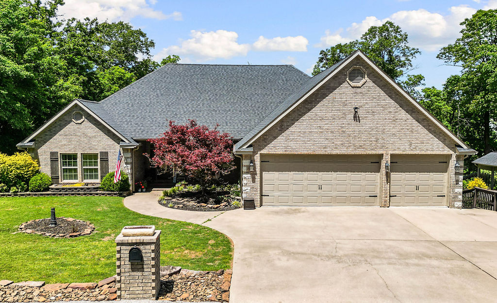 This exceptional dual dwelling property delivers quality, versatility, and standout curb appeal. The 2,016 sq ft main home features one level, 4 bedrooms, 2 bathrooms, and a dedicated office with soaring cathedral ceilings, hardwood and tile floors, and smart home upgrades throughout. Nest, Ring, central vacuum, and water softener included. The chef's kitchen shines with off white cabinetry, granite countertops, stone backsplash, under cabinet lighting, and a walk-in pantry. Outside, a refinished full length deck with a tiled covered entertaining area, ceiling fans, and floodlights frames spectacular views. The oversized 4 car tandem garage with 8-ft insulated doors is a rare bonus. The charming 590 sq ft secondary suite comes fully furnished, complete with 1.5 car garage, barn doors, open living, and private patio works perfectly as in-law suite, studio or home office. Lush, mature landscaping, a 2019 roof, and proximity to scenic trails complete this truly move-in ready package.