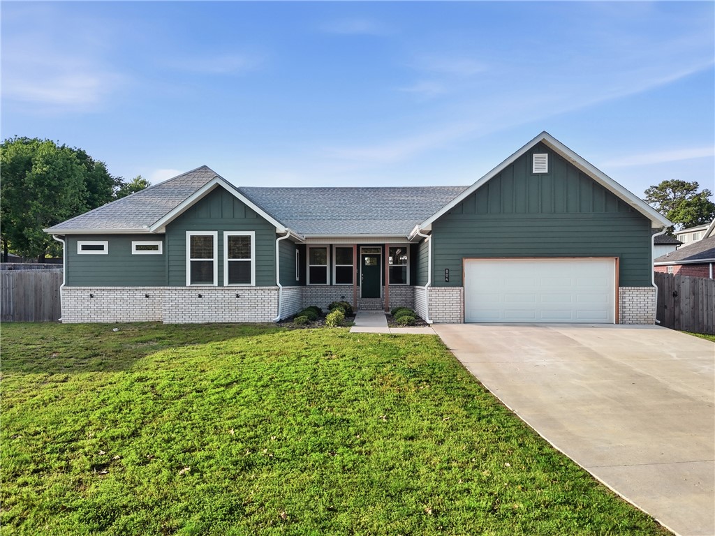Like-new home in Prairie Grove! Built in 2023 and located in Wakefield Park, this 2,240 sq ft 4 bed, 3 bath home features an open-concept layout with custom cabinetry, 3 cm granite countertops, durable LVP flooring, LED lighting, and a spacious living room with vaulted ceilings and wood beams. Built-in lockers in the mudroom add convenience, and window blinds are included. Stylish finishes throughout. Enjoy a great backyard with a privacy fence—perfect for summer gatherings! Great location within 0.5 mile of Prairie Grove Public Schools, 9.7 miles to the U of A, and 11.2 miles to downtown Fayetteville.