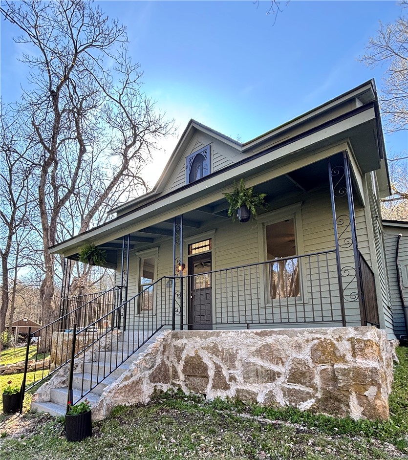 Welcome to 331 Dairy Hollow—perfect as a vacation home, second residence, or full-time living in The Iconic and Historic City of Eureka Springs. Built in the early 1900s, this home blends Victorian charm with modern updates, including a full Remodel of the kitchen and bath, to include brand New appliances and new washer and dryer. So many thoughtful updates can be seen throughout the home. New roof in 2023, New Plumbing, New HVAC, New Water/Sewer Lines, New Electrical, All of the Major renovations have already been done! As a BONUS newly added half bath upstairs enhances functionality for everyday living. Situated on 7 city lots, enjoy space for gardening, entertaining, or expansion. Privacy is right here and just minutes to downtown. This large lot is rare to find in city limits and even rarer to own 3 additional lots that are adjacent to this one. Experience timeless character with modern convenience in one of Arkansas’s most sought-after destinations. Your next chapter Starts here-book a showing today!