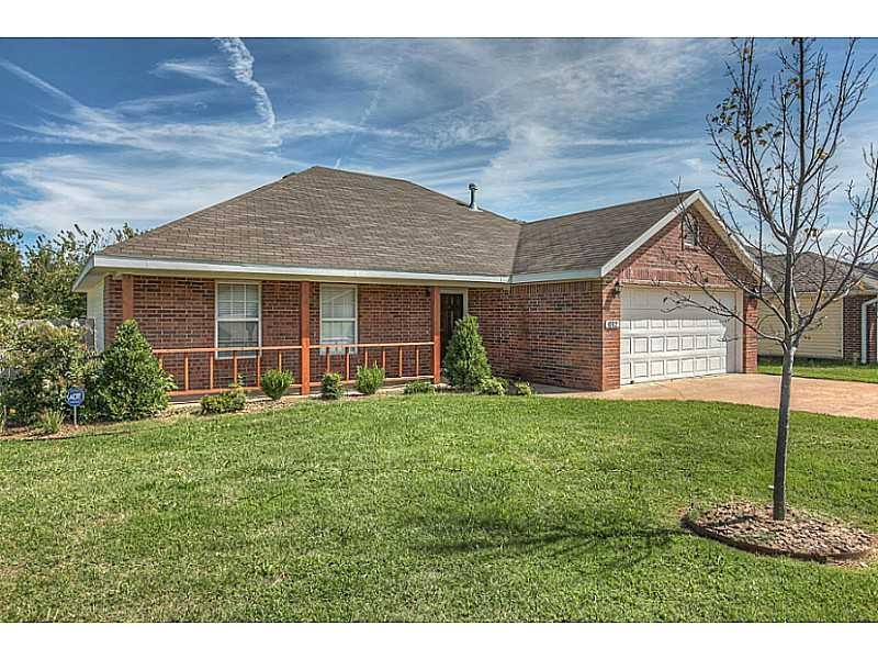 Updated home with custom touches. The living area has beautiful wood floors and a custom rock fireplace. Granite counters, stainless steel appliances and custom back splash in the kitchen with eating area. The house sits on a large corner lot with privacy fence.