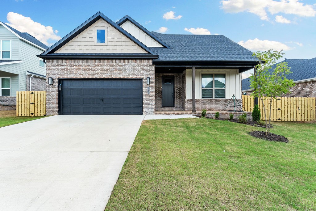 Discover the stork plan perfectly blended with traditional charm and modern design in this stunning 4-bedroom, 2.5-bath home located in the Yorktown Subdivision. With 2,009 sq ft of living space, this single-story home offers comfort, style, and functionality. Step inside to find LVP flooring flowing throughout the living room, kitchen, and hallways—offering both durability and easy maintenance. The modern kitchen features stainless steel appliances, ample cabinetry, and sleek finishes. Enjoy relaxing evenings on the covered back patio, or unwind in your fully fenced backyard. With a two-car garage, spacious bedrooms, and a primary suite designed for comfort, this home truly has it all.