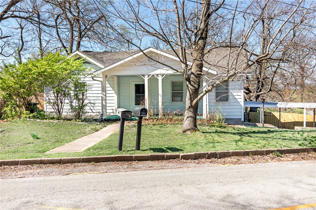 Fantastic opportunity to live upstairs and lease downstairs in this duplex on Mt Sequoyah. 2 beds and a full bath on each level, off street parking for 4 cars - 2 covered, with a fenced backyard. Washer , dryer, and refrigerator in both units to convey with acceptable offer. It's a short walk down the hill to Dickson Street, the Fayetteville Square, and the University of Arkansas or head up to the Mount Sequoyah overlook, Club Haus Fitness at Mt Sequoyah, and many  other monthly events hosted on Mt Sequoyah. Upstairs was recently leased for $1,800 / month and downstairs was recently leased for $1,500 month. Both upstairs and downstairs can be shown by appointment.