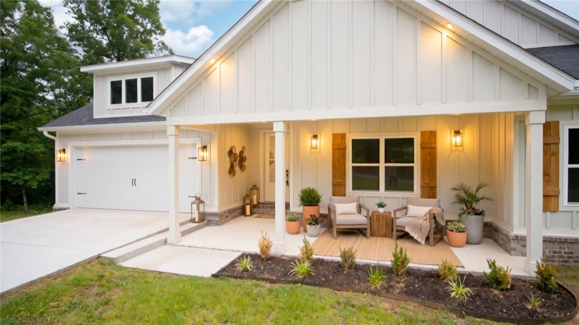 This gorgeous new construction has the privacy and views are you looking for in Bella Vista.  It is the perfect canvas to create your cozy hillside retreat. This home is conveniently located less than 10 min from I-49. From the moment you step inside, you’ll be drawn to the stunning 7” hand-scraped engineered white oak floors that flow seamlessly through an open, light-filled floor plan designed for both everyday living and effortless entertaining. Enjoy a small office with built-ins off the living room. Step outside to your oversized back deck—an ideal spot for morning coffee, evening gatherings, or simply soaking in the peaceful wooded views.  Enjoy neighborhood walks offering peaceful lake views. Enjoy access to Bella Vista’s premier amenities, including world-class MTB trails, lakes, golf courses, pools, fitness centers, tennis & pickleball courts, an archery range, and even relaxing saunas. You’re not just buying a home—you’re stepping into a lifestyle of comfort, adventure, and natural beauty.