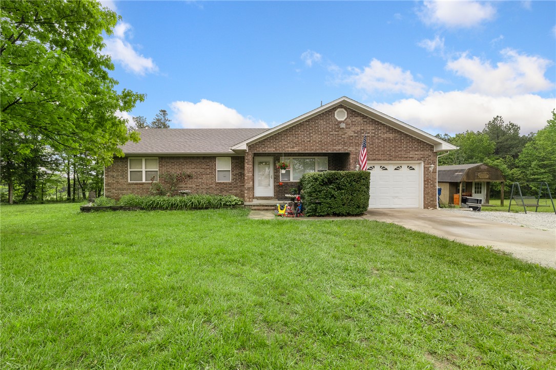 Welcome to your slice of country living in Harrison! This 3 bedroom, 2 bathroom home sits on a beautiful 8.60-acre tract, offering the perfect blend of space, privacy, and opportunity. The property features a spacious 2,400 square foot shop complete with electric and water ideal for hobbies, storage, a home business, or all three. Inside, the home has already seen some thoughtful remodeling, giving buyers a solid head start while still leaving room to add personal touches. To help make it your own, the seller is offering a $5,000 flooring allowance, allowing you to update carpet and laminate to match your style and preferences. Whether you're looking for a mini farm, a workshop haven, or simply room to spread out and enjoy the Ozarks, this property delivers versatility and value. With acreage like this, functional outbuildings, and financial incentives already in place, it’s a rare find in today’s market. Don’t miss your chance to turn this property into your dream home!