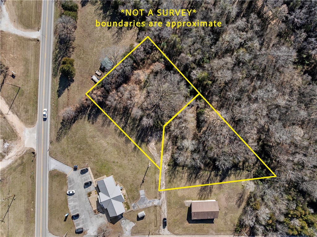 Build your dream home, lake getaway, or investment property on this 1.21-acre double lot located just minutes from Bull Shoals Lake in the Ozarks. Enjoy small-town living 20 minutes from Harrison, AR and 35 minutes from Branson, MO, with easy access to boating, fishing, marinas, dining, and entertainment. Situated in a quiet, established neighborhood, this oversized lot offers added space, privacy, and flexibility rarely found this close to the lake. Public water and sewer are available at the road (buyer to verify utilities). Ideal for a primary residence, vacation home, or short-term rental opportunity, this property combines location, acreage, and convenience in one of North Arkansas’s most sought-after lake areas. Experience the relaxed Ozark lifestyle with modern access close by.