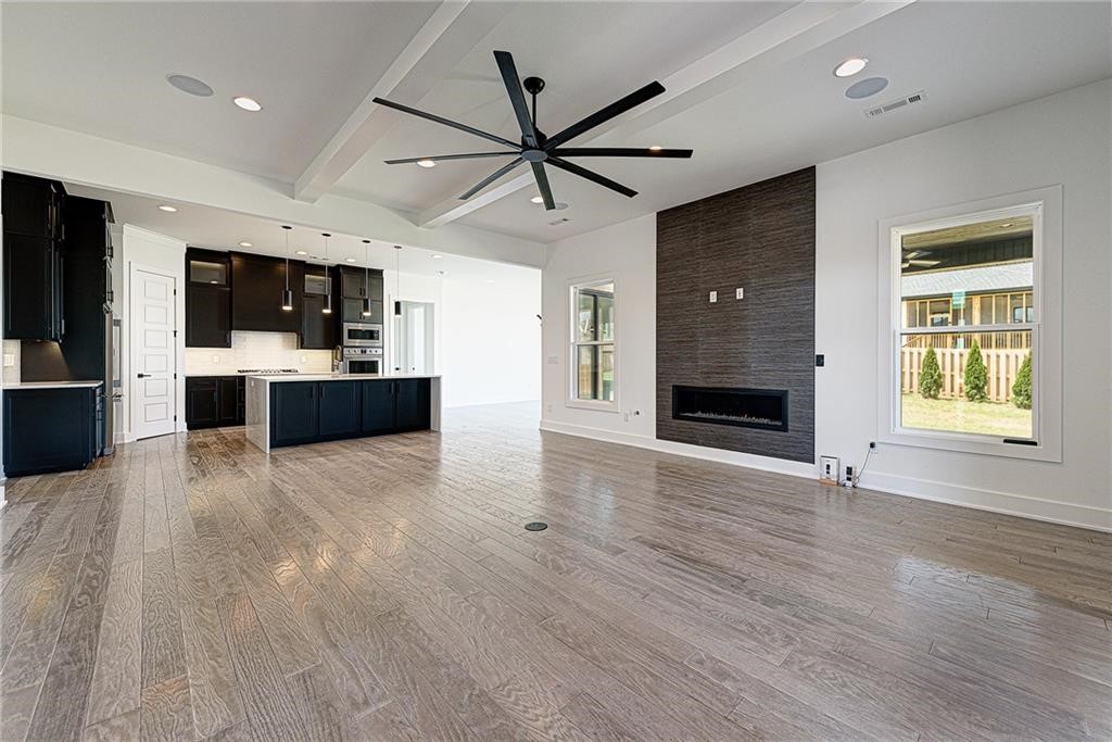 Welcome to 8609 Feathered Nest Run, a beautifully designed home in Scissortail subdivision. This residence offers a thoughtful layout all on one story. This residence features 4 spacious bedrooms, 3 full bathrooms, and a large bonus room, providing ample space for daily living, entertaining, or work-from-home flexibility. The open-concept main living areas create a welcoming flow to the kitchen and dining spaces. The bonus room adds valuable flexibility—perfect for a playroom, media room, or additional lounge space. Step outside to enjoy outdoor living under a covered back porch, ideal for relaxing evenings or hosting gatherings year-round.