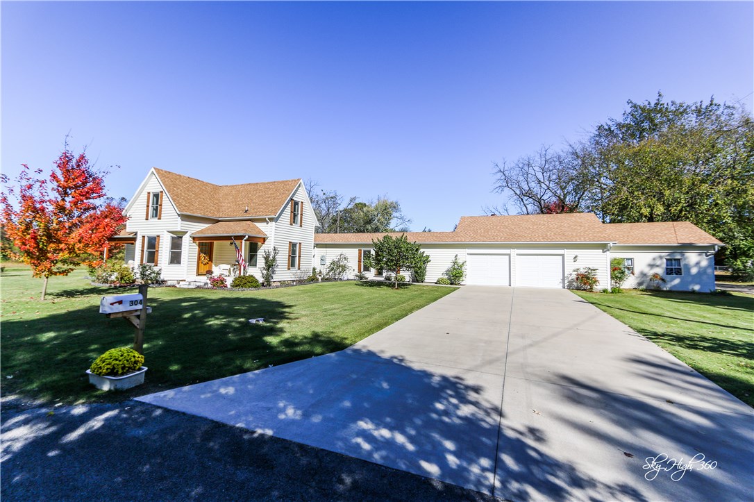 Beautiful historic home with charm & character completely remodeled in 2012. Hardwood floors & tile throughout, granite countertops, walk-in pantry, bonus room upstairs & office space downstairs. Located in the heart of Prairie Grove, walking distance to schools & battlefield! Renovations included all new plumbing & electrical throughout. Transferable 44yr remaining warranty on the siding, 14 yr on windows, 5 yr on gas range and BRAND NEW roof with transferable warranty.