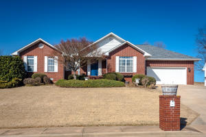 Priced for Quick Sale! Great house in the Estates at Harrison Country Club! Immaculate and move-in ready. This brick home is quality constructed, and features 3 bedrooms, 2 baths, office, formal dining, spacious living room with tall vaulted ceiling. Beautiful wood floors in the living room, dining room, kitchen and master b/r. The bedrooms are all very spacious. Large master suite features walk in closet, jetted  tub plus separate shower. Newer roof, appliances, water heater and updated HVAC. Can't beat the location, you can drive your golf cart to the course, but the back yard is private, overlooking beautiful pasture.  This is a great house at a great price. Kitchen appliances will convey with the home, including an almost new stainless  french door refrigerator with dual ice makers!