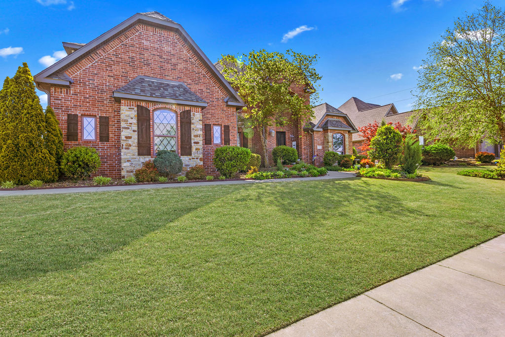 Meticulously maintained home offers perfect blednd of comfort, functionality and lifestyle in highly sought-after Lochmoor community. Direct access to Greenway just 40 yards from the driveway, along w/ community amenities inc pools, hot tub, tennis, racquetball & basketball courts, playground and pavilion. Newly remodeled kitchen boasts ceiling-height cabinetry, quartz countertops & backsplash, dedicated appliance storage, and breakfast nook w/ additional storage. Refinished wood floors and cathedral ceilings create an open, inviting feel throughout. Recent updates inc new roof, gutters, counter flashing, and lighting fixtures, offering peace of mind for years to come. Home also features 100” theater screen w/ surround sound, perfect for entertaining. Oversized corner lot w/ a built-in natural gas grill, expanded patio space, and freshly stained privacy fence ideal for relaxing or hosting. Rare opportunity to enjoy community, convenience, and thoughtful upgrades in one of Bentonville’s most desirable neighborhoods.