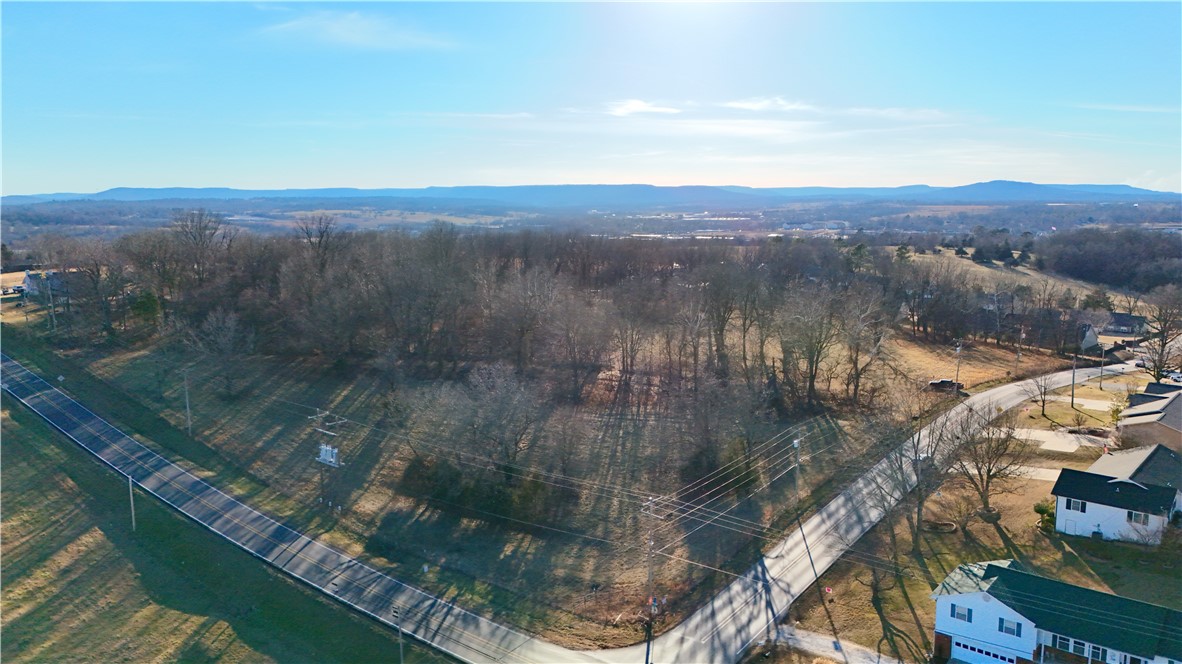 Discover an exceptional opportunity to own 34 m/l acres of prime land in Harrison, located in one of the area’s most desirable and fastest-growing locations. This expansive property is perfectly suited for future subdivision development, offering ample space and flexibility for builders, developers, or investors. The property also includes a four-bedroom, two-bath home, providing immediate use as a residence, rental, or on-site headquarters while planning future development. With its size, location, and versatility, this land presents endless potential—whether you envision a residential subdivision, private estate, or long-term investment. Opportunities like this in Harrison are increasingly rare. Don’t miss the chance to secure a property with both immediate value and outstanding future upside. Just 30 minutes from Buffalo River, Bull Shoals Lake and Branson, MO.