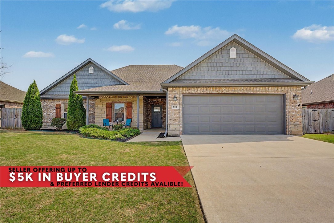 This charming home features a landscaped front entry, freshly re-stained and sealed wood shutters and a spacious covered front porch. Inside, the living room offers wood floors, vaulted ceilings, and a tiled gas fireplace. The kitchen is designed for function and flow with an eat-in layout, coffee nook, ample cabinetry with 3 Lazy Susans, extra prep-space and granite countertops throughout. Primary includes crown molding, a tray ceiling, and a large walk-in closet. The en-suite features a jetted tub with tiled surround and a floor-to-ceiling tiled shower with glass door. Additional bedrooms offer natural light, walk-in closets with built-ins. Laundry room with upper cabinetry and utility sink. Step outside to a fully fenced backyard with a covered patio, 12x8 shed and a custom 445sqft stamped concrete addition, perfect for entertaining. 5 minutes to Prairie Grove Elem. & downtown, near parks/trails. Seller to credit up to $3,000 in closing costs with acceptable offer & ask about the preferred lender credit!